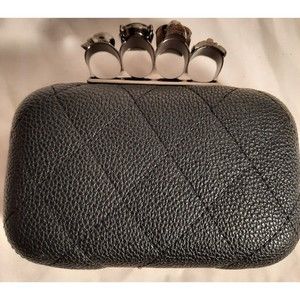 Quilted black crossbody clutch skulls knuckle holder